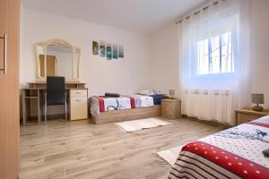 Postel nebo postele na pokoji v ubytování Apartment Buddy