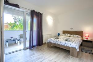 Postel nebo postele na pokoji v ubytování Apartment Buddy