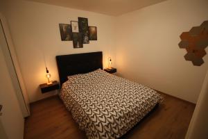 Postel nebo postele na pokoji v ubytování Châtel - Appartement 4-6 personnes - Les Châlets des Freinets C203