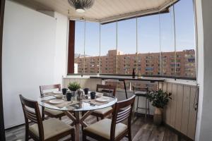 Balkón nebo terasa v ubytování Palmeras Suite Fuengirola
