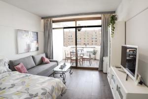 Postel nebo postele na pokoji v ubytování Palmeras Suite Fuengirola