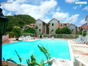 Bazén v ubytování SOMPTUEUX DUPLEX SUR LA ROUTE DES PLAGES nebo v jeho okolí