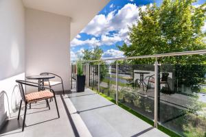 Balkón alebo terasa v ubytovaní Apartament UKIEL PARK 30 przy Plaży Miejskiej - klimatyzacja,free parking,FV
