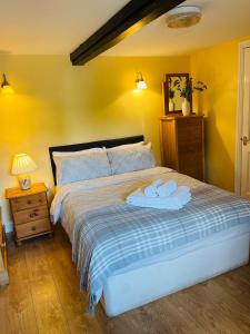 מיטה או מיטות בחדר ב-The Boat Inn Hayton