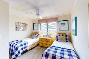 Katil atau katil-katil dalam bilik di Dunescape Villas III +13 gambar