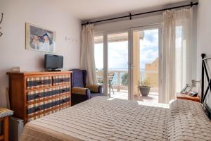 Posteľ alebo postele v izbe v ubytovaní Spectacular penthouse in front of the sea, 200 m2 terrace - Arruzafa Playa