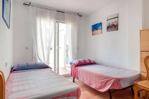 Posteľ alebo postele v izbe v ubytovaní Spectacular penthouse in front of the sea, 200 m2 terrace - Arruzafa Playa