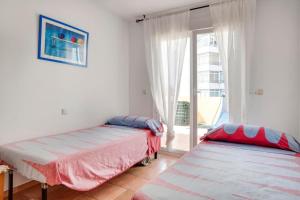 Posteľ alebo postele v izbe v ubytovaní Spectacular penthouse in front of the sea, 200 m2 terrace - Arruzafa Playa