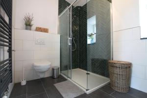 Ένα μπάνιο στο Apartment Meerzeit mit Terrasse