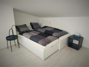 Postel nebo postele na pokoji v ubytování Apartmán Tommy - Zadov