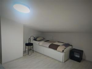 Postel nebo postele na pokoji v ubytování Apartmán Tommy - Zadov
