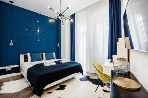 Posteľ alebo postele v izbe v ubytovaní De Luxe Studio with Balcony in the Absolute Center