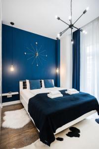Posteľ alebo postele v izbe v ubytovaní De Luxe Studio with Balcony in the Absolute Center