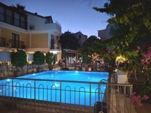 Bazén v ubytování Hotel Barlas Fethiye nebo v jeho okolí + 27 fotografií