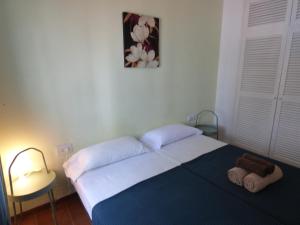 Postel nebo postele na pokoji v ubytování Rigel Es Pujols