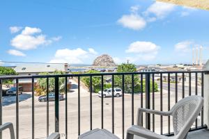 a balcony with a view of a parking lot at Hotel Avisa Downtown in Morro Bay
