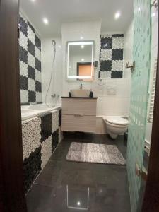 Een badkamer bij Premium Apartment Targoviste