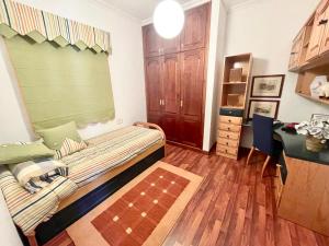 a small room with a bed and a desk at Villa for nature lovers in Vilaflor