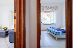 En eller flere senge i et værelse på CASA IDA