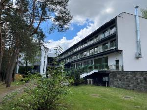 Budova, v ktorej sa apartmán nachádza + 17 fotografií