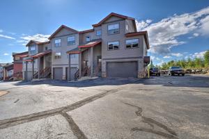 a large house on a street with a parking lot at 8 Mi to Keystone Mtn-View Ski Retreat! in Silverthorne