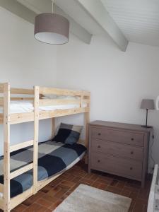 Posteľ alebo postele v izbe v ubytovaní La Villa du Tesselier