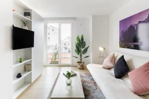 Μια τηλεόραση ή/και κέντρο ψυχαγωγίας στο Loft minimalista impecable En pleno Centro Histórico