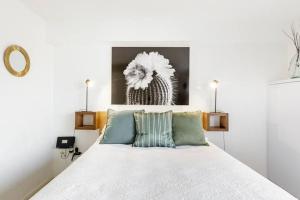 Ένα ή περισσότερα κρεβάτια σε δωμάτιο στο Loft minimalista impecable En pleno Centro Histórico