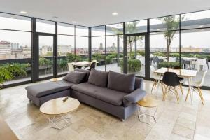 Χώρος καθιστικού στο Loft minimalista impecable En pleno Centro Histórico