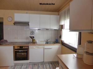 Kuchyň nebo kuchyňský kout v ubytování Schöne Unterkunft in idyllisch ländlicher Lage + 3 fotografie