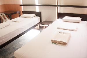 Letto o letti in una camera di GV Hotel - Ormoc