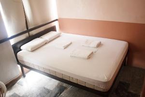 Letto o letti in una camera di GV Hotel - Ormoc