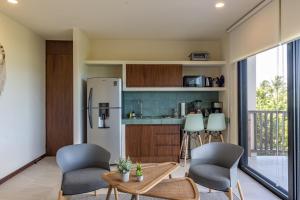 Kuchyň nebo kuchyňský kout v ubytování Ocean View Loft in Punta Cocos - D102