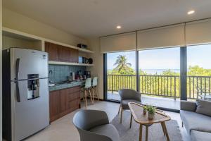 Kuchyň nebo kuchyňský kout v ubytování Ocean View Loft in Punta Cocos - D102