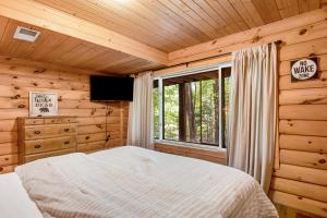 Postel nebo postele na pokoji v ubytování Ishkode Chalet