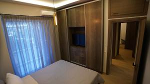 Posteľ alebo postele v izbe v ubytovaní Ventiri Family Suite 1