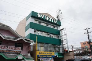 a building with a hy hotel on top of it at GV Hotel - Naval in Biliran