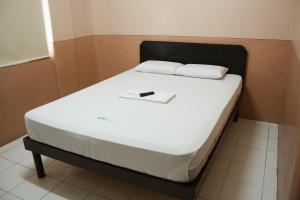 Postel nebo postele na pokoji v ubytování GV Hotel - Naval