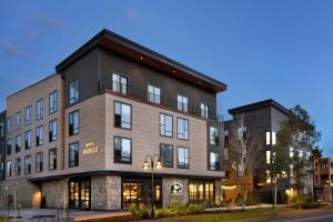 a rendering of the new mcdonalds building at night at Indigo - Silverthorne, an IHG Hotel in Silverthorne