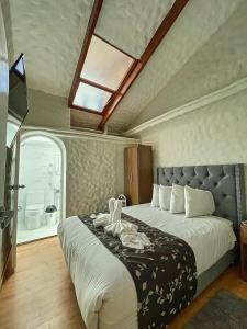 Postel nebo postele na pokoji v ubytování Casona Plaza Hotel Cusco
