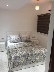 Katil atau katil-katil dalam bilik di Neama Bay -Diar El Rabwa Modern pool View