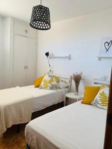 Posteľ alebo postele v izbe v ubytovaní Charming & cosy beach apartment