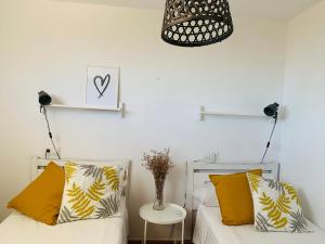 Posteľ alebo postele v izbe v ubytovaní Charming & cosy beach apartment