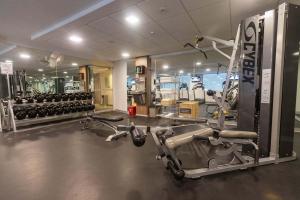 a gym with several treadmills and exercise bikes at Casa Andina Select Arequipa Plaza in Arequipa