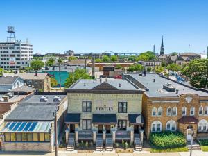 an aerial view of a building in a city at The Bentley Condotel, Heart of Walkers Point with Garage, Yard in Milwaukee