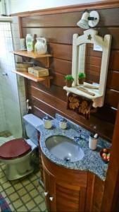 Ванна кімната в Chalé Canoas - Conforto na serra de Teresópolis