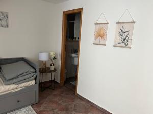 Posteľ alebo postele v izbe v ubytovaní Old Town Square Apartments