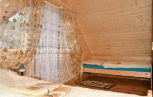 Ένα ή περισσότερα κρεβάτια σε δωμάτιο στο 2 Bedroom Gorgeous Home In Sianozety