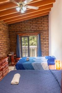 Postel nebo postele na pokoji v ubytování CASA ANTARES
