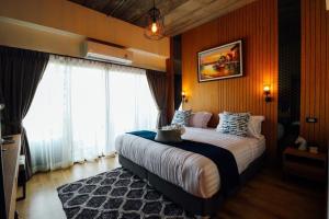 Postel nebo postele na pokoji v ubytování Tree​ for​ rest​ poshtel